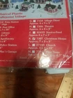 Mary Maxim Musical Plastic Needlepoint Village Christmas House #7307 New. Price: $15.00.