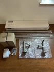 Delta 75925-SS Trinsic 24" Wall Mounted Double Towel Bar, Stainless Open. Price: $39.99.