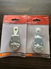 Set Of Two 1-1/2" Swivel Pulley -N100-326 New. Price: $12.00.