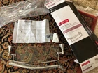Read- Delta Cassidy 18" Glass Shelf W/ Bar Brilliance Stainless FINISH-79710 Open. Price: $29.00.