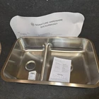 Signature Hardware 34" Calverton Low Divide Double Bowl Stainless Steel Sink Open. Price: $320.00.