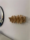 Umbra Picket Wall Mount Coat Rack, 5 Flip-down Wood Hooks, Natural Open. Price: $48.87.