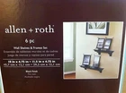 New In Box ! Allen And Roth, 6 Piece Wall Shelf Picture Frame Set. Price: $29.99.