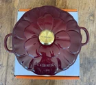 Creuset Signature Cast Iron Petal Shallow Casserole 2.25QT Garnet Rhone New. Price: $449.99.