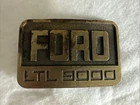 Vintage Ford Ltl 9000 Logo Belt Buckle Rjr Roberts & Co Brass Made Usa Pre-owned. Price: $35.00.