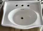 Signature Hardware Cierra Wall-mount Sink 24" With 8" Widespread Faucet Holes Open. Price: $150.00.
