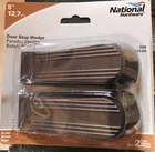 National Hardware N213-603 Wedge Door Stop, 5", Brown, 2-PACK New. Price: $9.99.