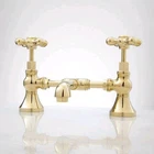 Signature Hardware Monroe Bridge Lavatory Faucet Cross Handles Polished Brass Open. Price: $175.00.