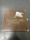Signature 483950 Lexia Wall Mounted Towel Ring, Polished Brass, 6-5/16 In. Used. Price: $37.61.