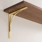 Signature Hardware Trisden 9IN Brass Wall Mount Shelf Bracket, Polished New. Price: $46.00.