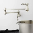 Signature Hardware 329631 Vivan Double Handle Wall Mounted Pot Filler Open. Price: $298.99.