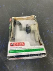 Delta 77760-SS Vero Tank Lever, Left Mount Brilliance Stainless Used. Price: $40.22.