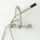 Signature Hardware Sebastian Wall-mount Tub Faucet, 4" Couplers Brushed Nickel Open. Price: $379.96.
