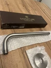 Signature Hardware SHRSA123ZBN 12" Rain Shower Arm And Flange - Brushed Nickel Open. Price: $18.99.