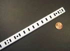 Kv #255WH-24" Pilaster Strip Steel, White Epoxy Finish, Length, 5/8" Width New. Price: $7.95.