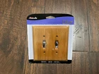 2X Nib Amerelle Solid Oak Wallplate Model 4025TT New. Price: $14.99.