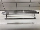 Moen DN0794CH 24 Inch Hotel Style Towel Shelf With Bar Open. Price: $65.00.