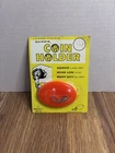 New Vintage 1968 Orange Quikoin Coin Holder Keychain Squeeze Change Purse. Price: $31.00.