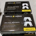 (2) Sets Of Gorilla Mpx Rail Brackets New. Price: $59.10.