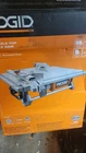 Ridgid R4021 7 Inch 6.5AH Table Top Wet Tile Saw New. Price: $100.00.