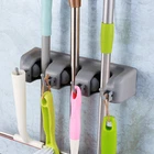 Togu Mop And Broom Holder Wall Mounted 3 Position Storage Rack Slots, Gray New. Price: $17.06.