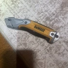 Dewalt - Retractable Utility Knife DWHT10998 Used. Price: $13.75.