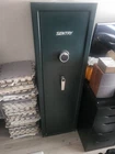 Sentrysafe, Fireproof, Upright, Locking Combination, Gun Rifle Used. Price: $300.00.