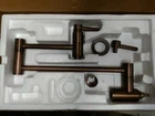 Signature Hardware Contemporary Wall-mount Pot Filler, Oil Rubbed Bronze Open. Price: $189.95.