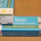 One Hes 9600-630 Surface Mount Rim Exit Windstorm Rated Electric Strike New. Price: $404.46.